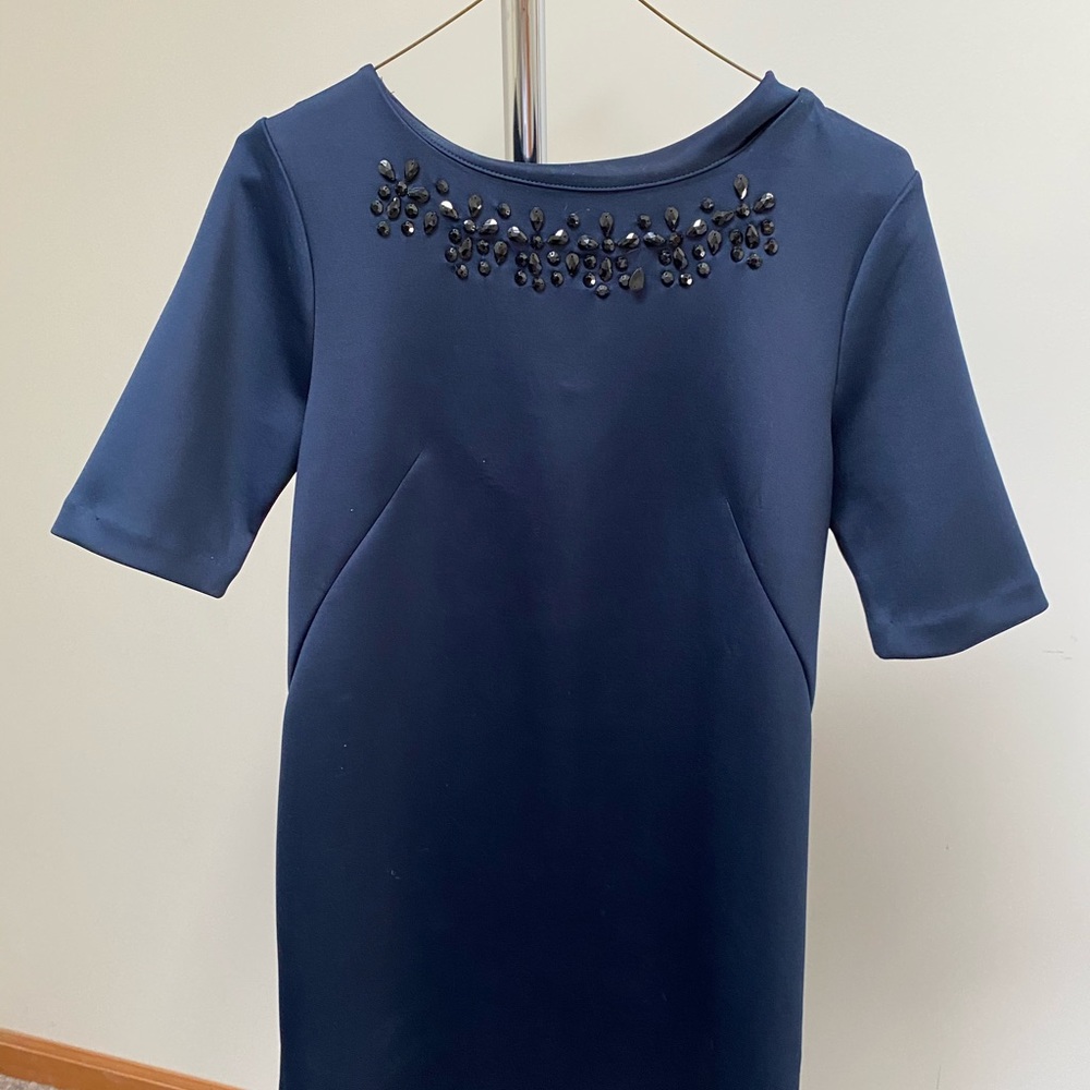 Navy blue shift dress with neck embellishments